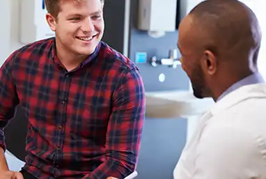 man talking with doctor