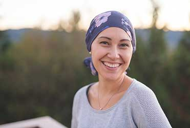 woman with cancer smiling