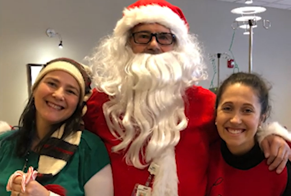 grateful patient Gary volunteering as Santa Claus