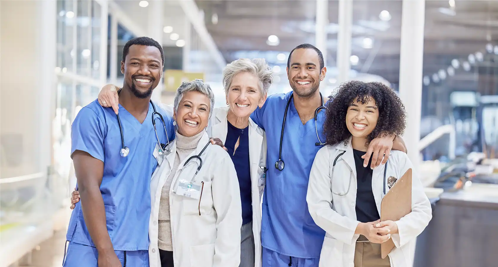 providers smiling in hospital lobby